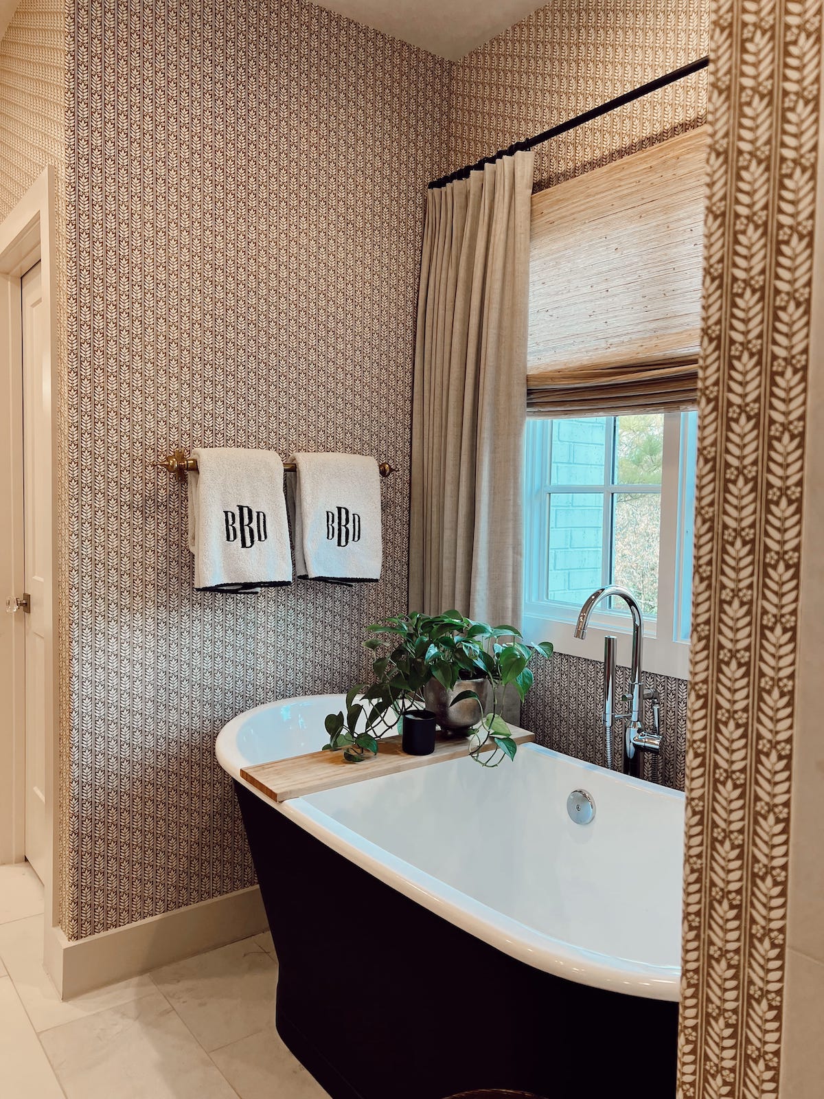 brighton butler bathroom with wallpaper update black tub Weezie monogrammed towels 